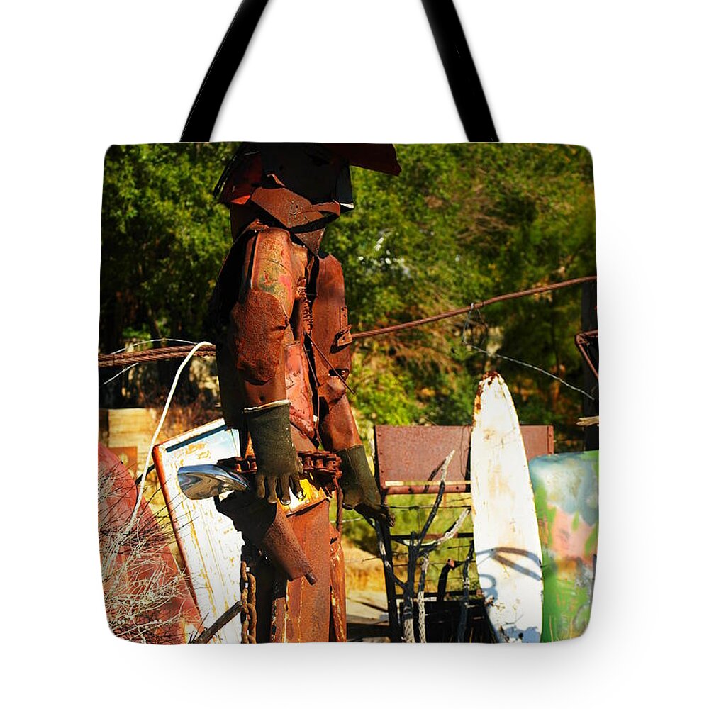 Steel Art Tote Bag featuring the photograph Steel Gunfighter by Jeff Swan