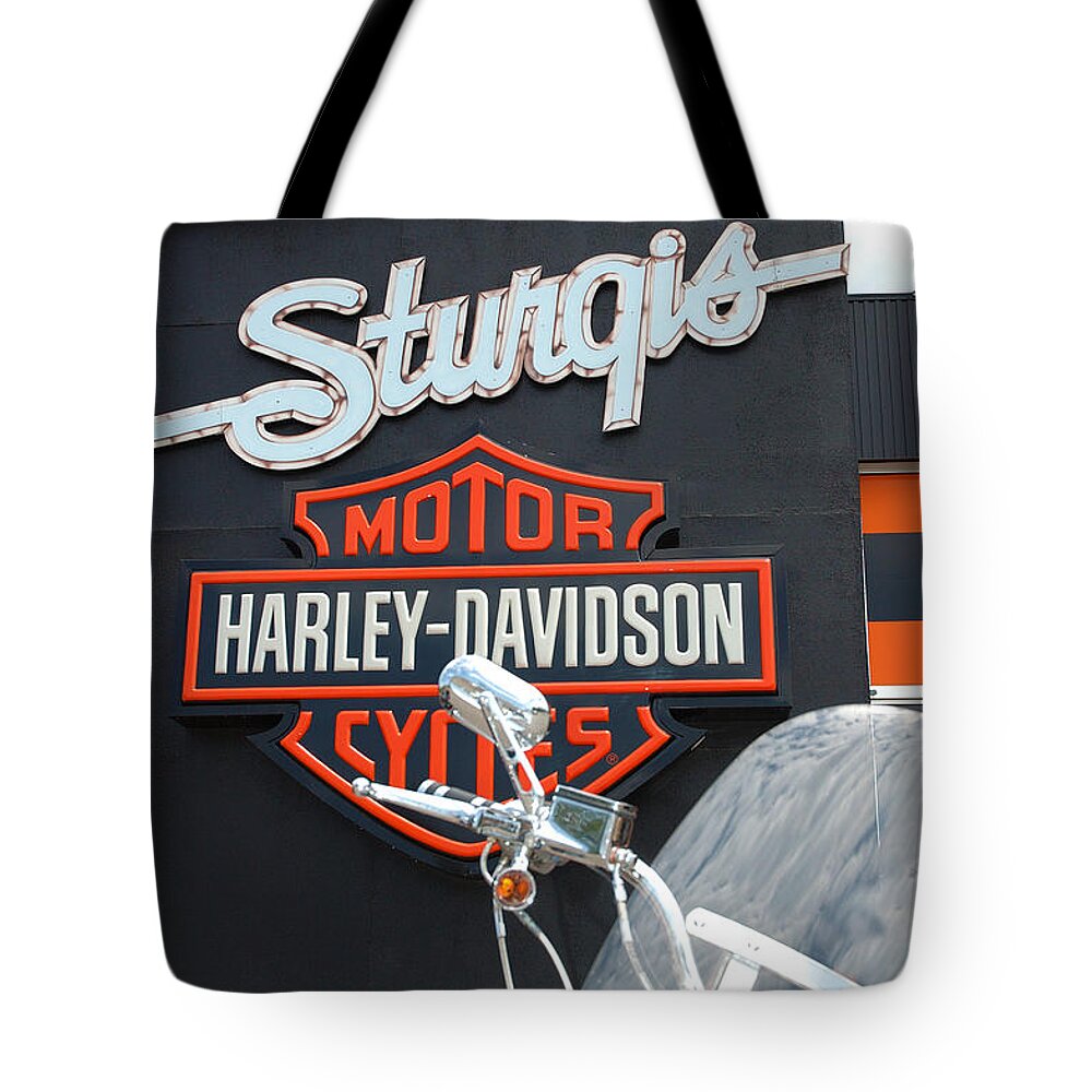 Sturgis Tote Bag featuring the photograph Sturgis Harley store by Micah May