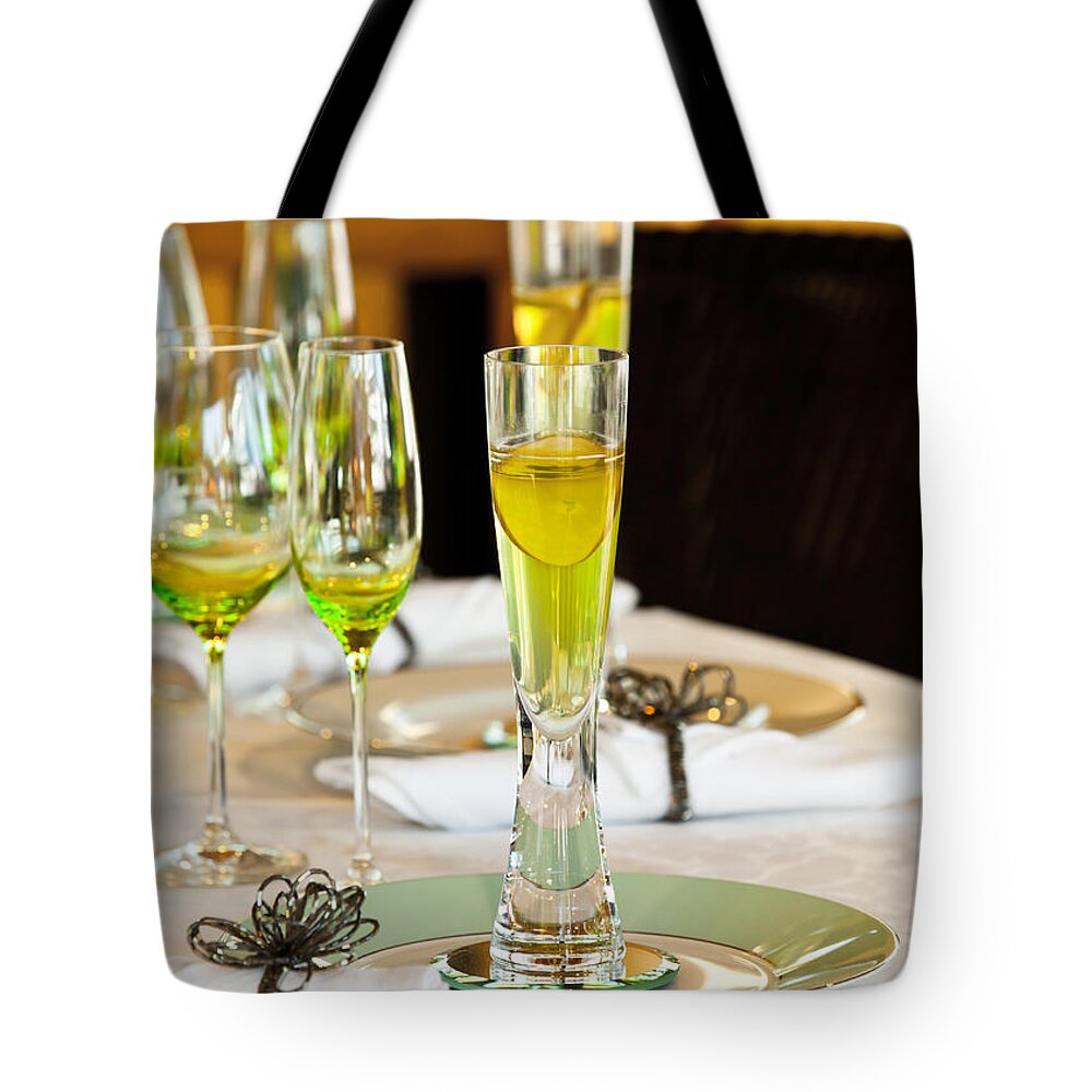 Stylish Dining Table Arrangement Close Up Tote Bag featuring the photograph Stylish dining table arrangement by Simon Bratt