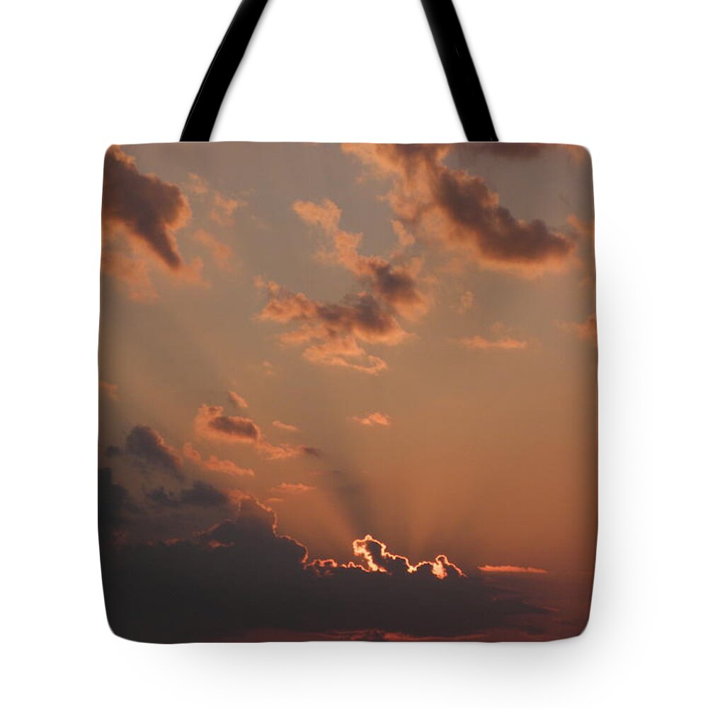 Sunrise Tote Bag featuring the photograph Sunrise In The Clouds by Kim Galluzzo