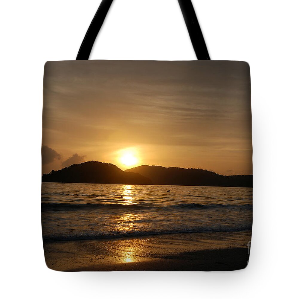 Sunset Beach Photo Tote Bag featuring the photograph Sunset by Ivy Ho