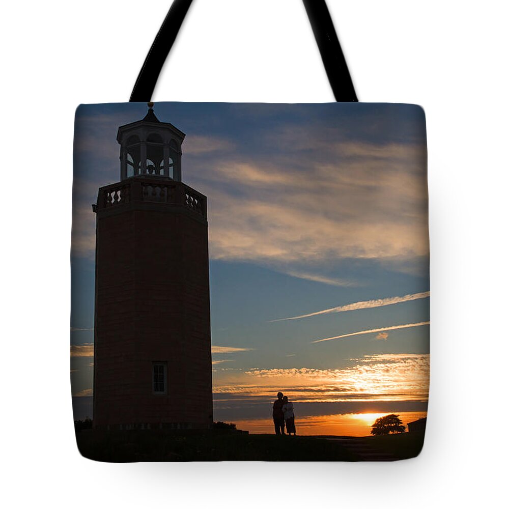Sunset Tote Bag featuring the photograph Sunset Lighthouse by David Freuthal