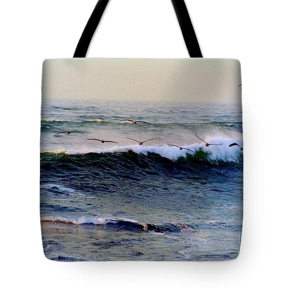 Pelican Tote Bag featuring the photograph Sunset Watch by Kathy Bassett