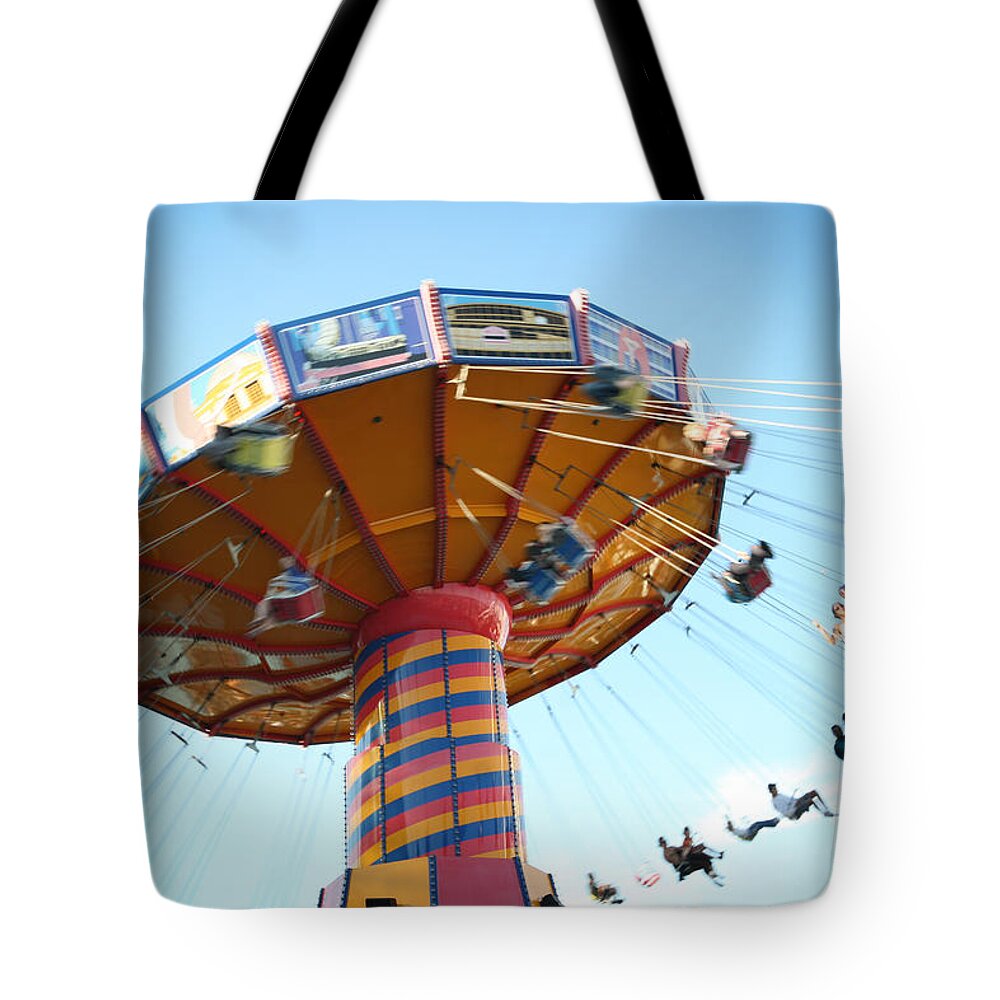 Swings Tote Bag featuring the photograph Swings by Leslie Leda