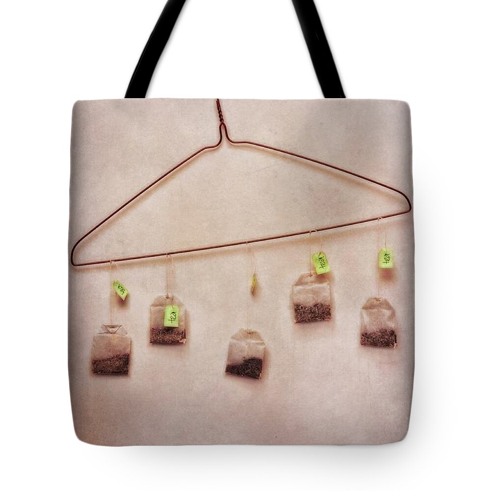 Tea Tote Bag featuring the photograph Tea Bags by Priska Wettstein