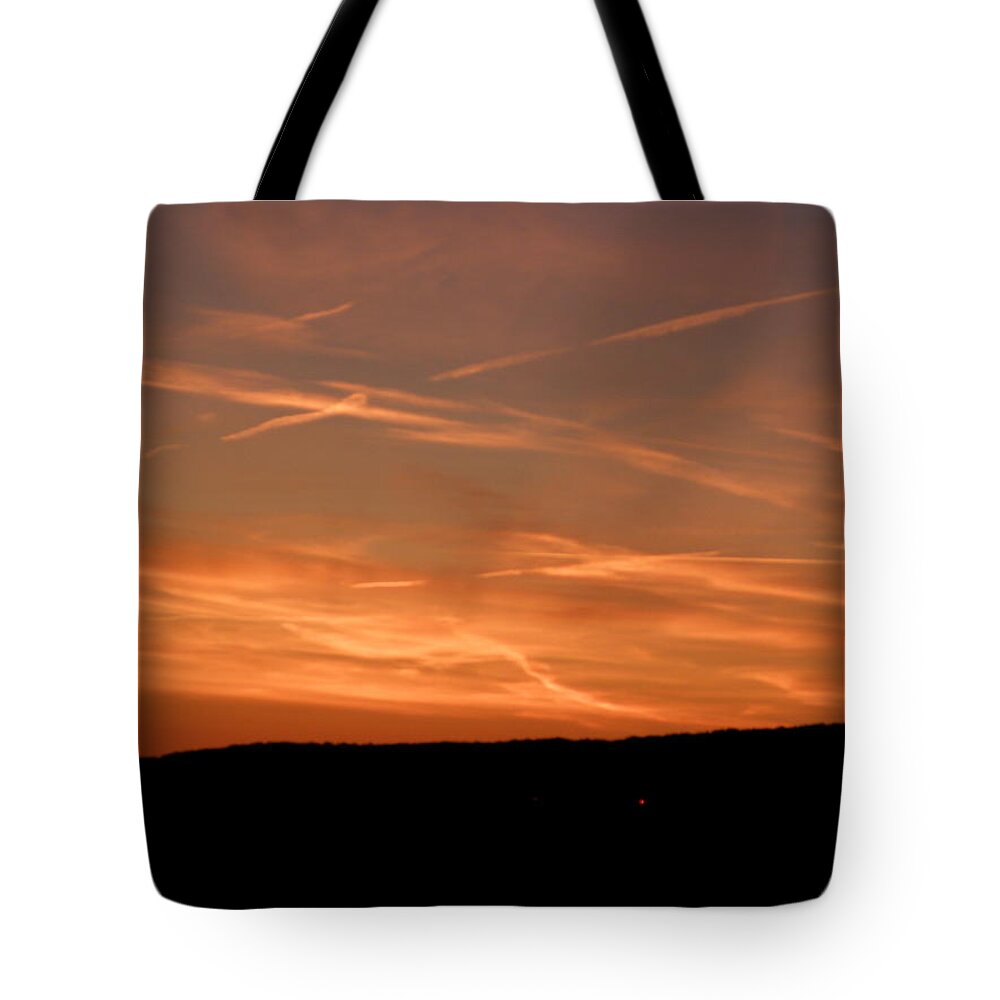 Clouds Tote Bag featuring the photograph The Beauty Of Clouds At Sundown by Kim Galluzzo