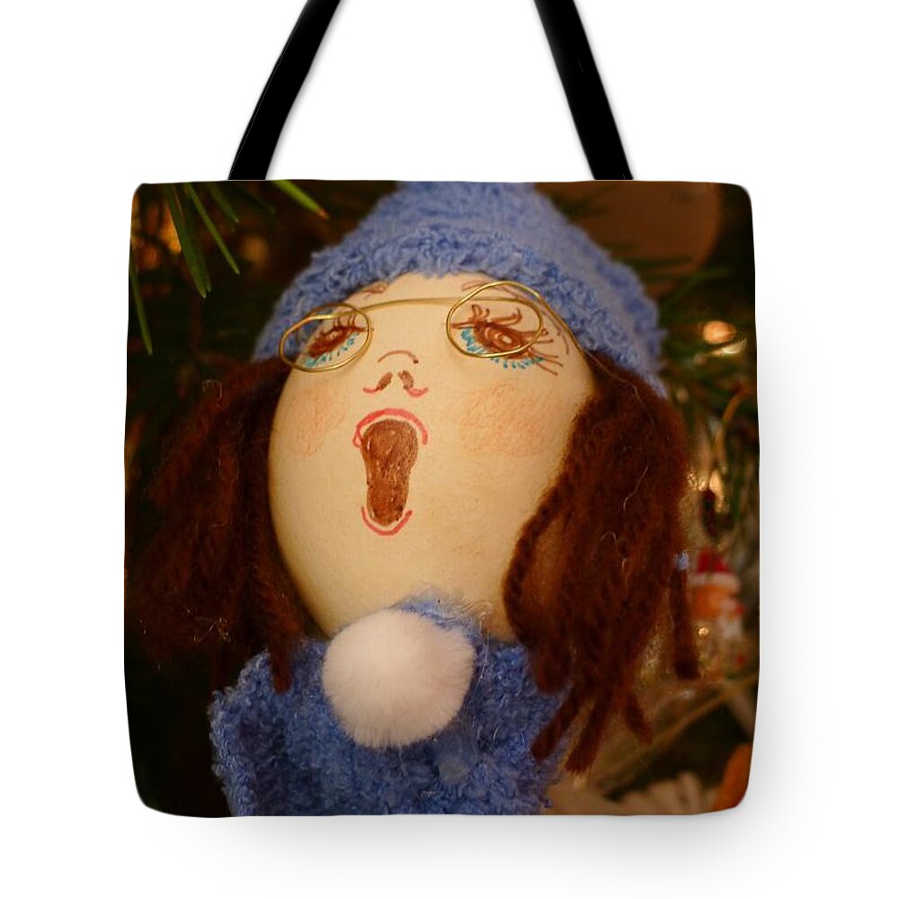 Egg Tote Bag featuring the photograph The Carol Singer by Richard Reeve