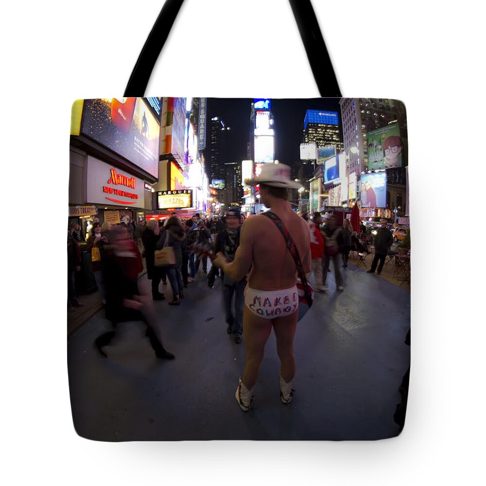Naked Cowboy Tote Bag featuring the photograph The famous Naked Cowboy performing in Time Square by Sven Brogren