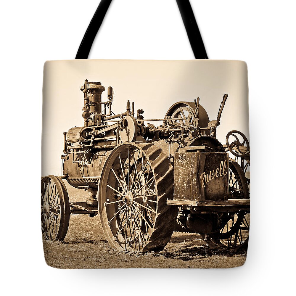 Sepia Tote Bag featuring the photograph The Old Steam Tractor by Steve McKinzie