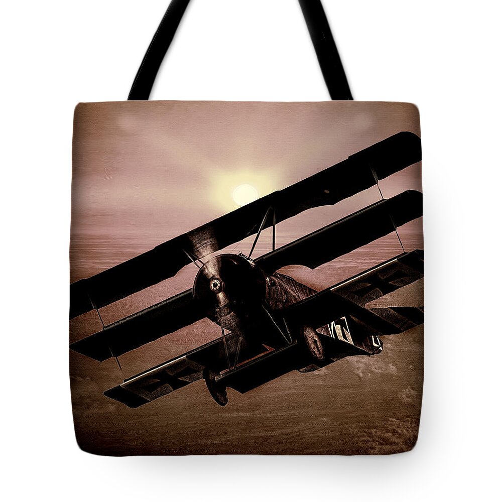 Fokker Tote Bag featuring the photograph The Red Baron's Fokker at Sunset by Chris Lord