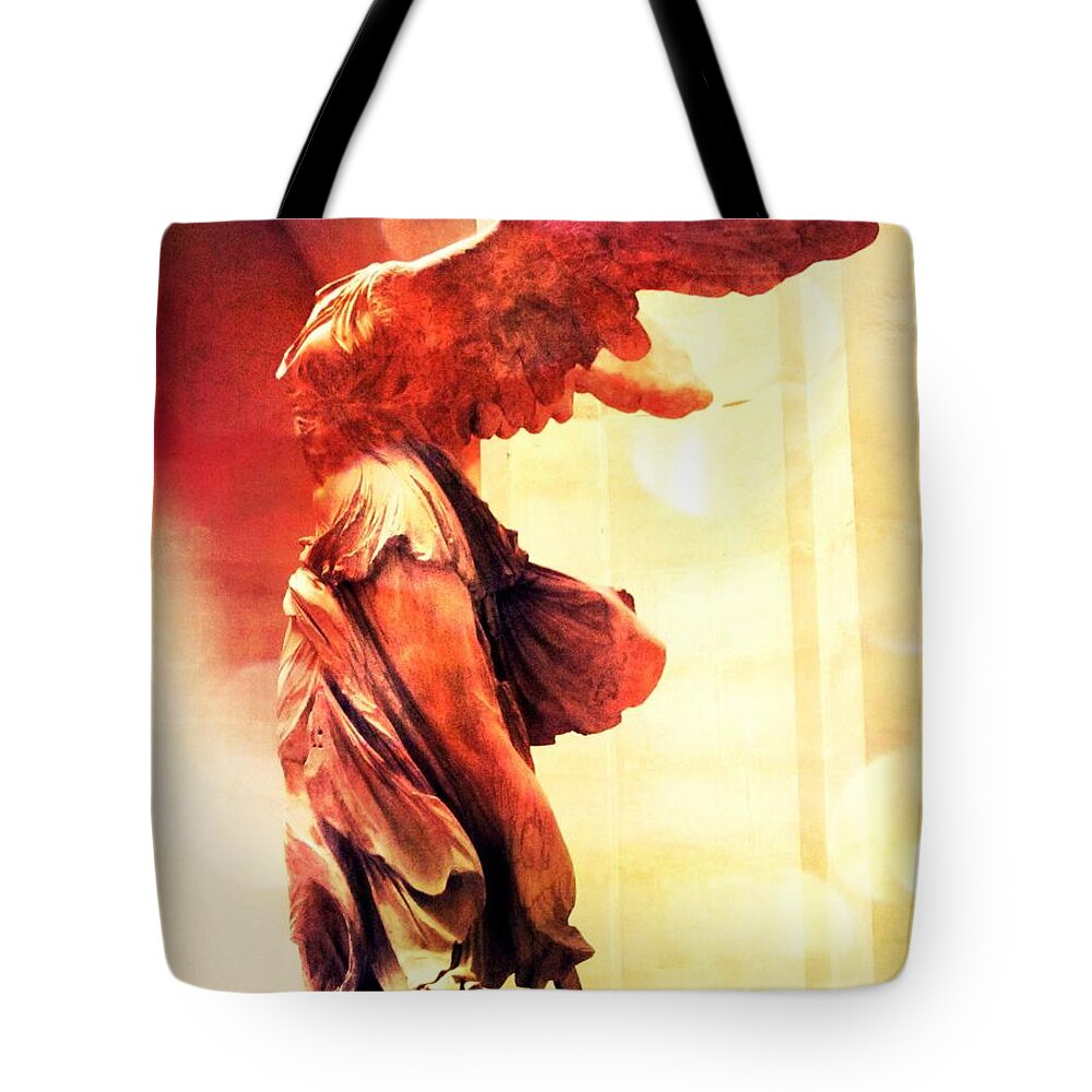 The Winged Victory Tote Bag featuring the photograph The Winged Victory by Marianna Mills