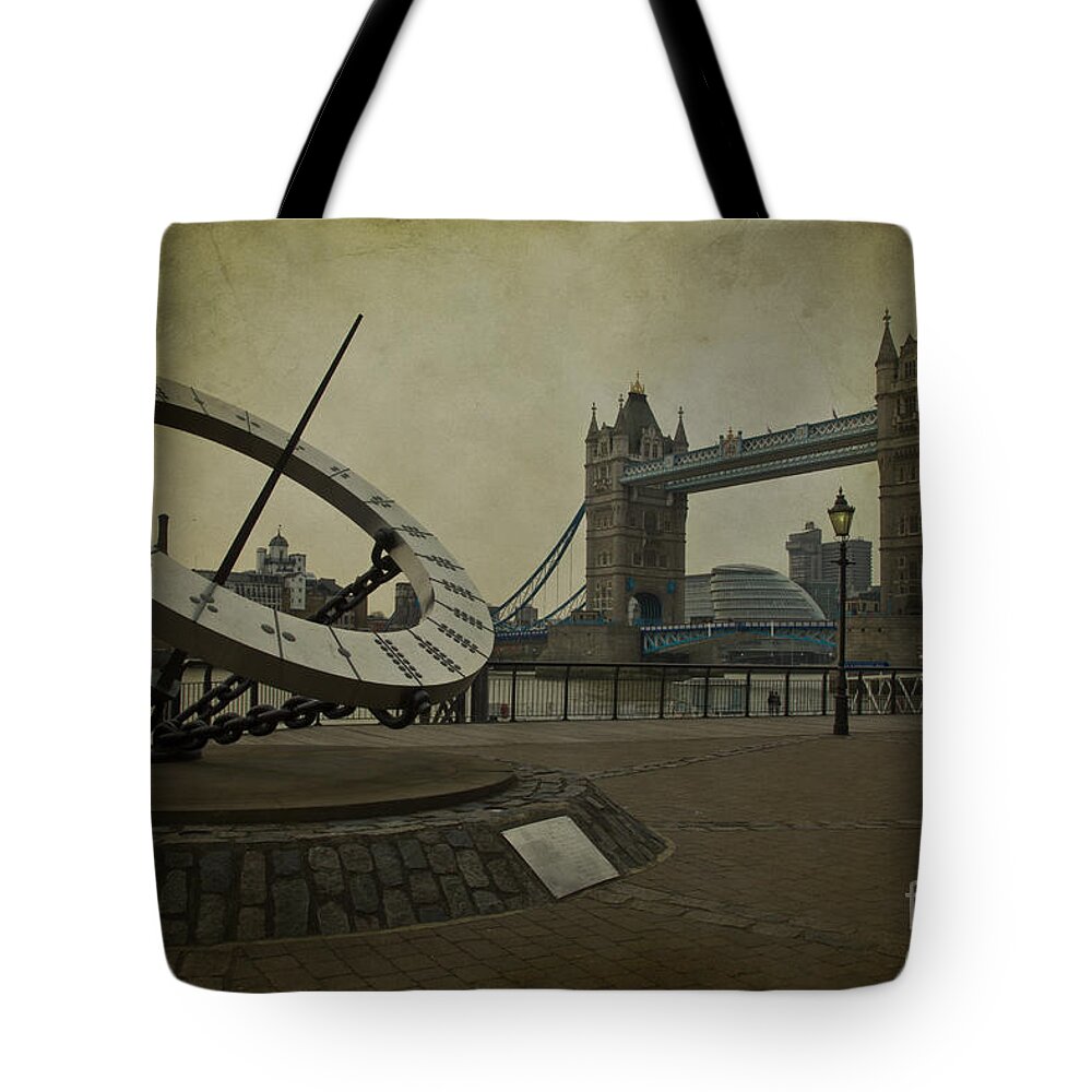 Tower Bridge Tote Bag featuring the photograph Timepiece. by Clare Bambers