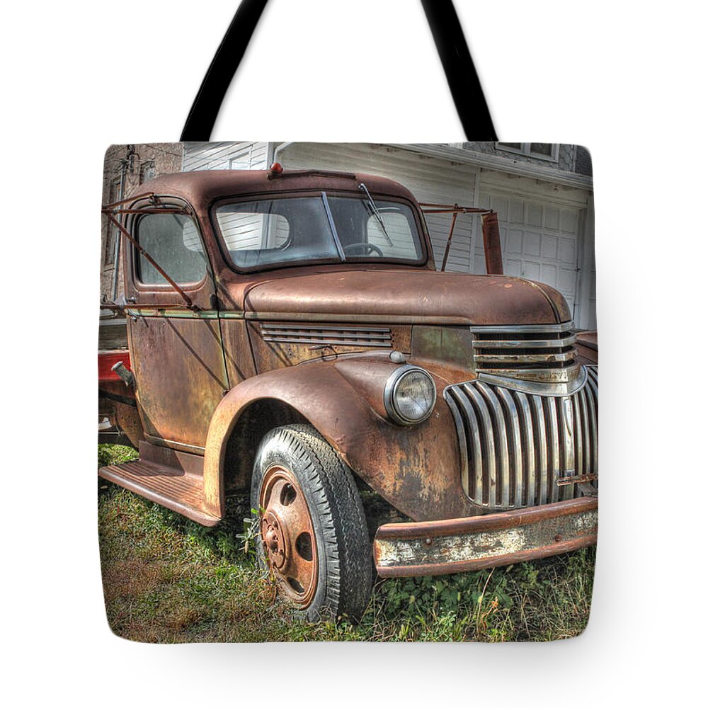 Old Tote Bag featuring the photograph Tough Old Workhorse by J Laughlin