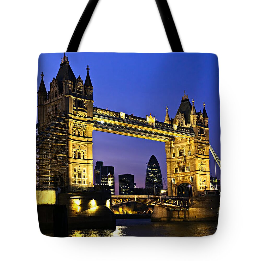 Tower Tote Bag featuring the photograph Tower bridge in London at night by Elena Elisseeva