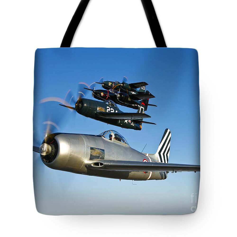 Transportation Tote Bag featuring the photograph Two Grumman F8f Bearcats And Two F7f by Scott Germain