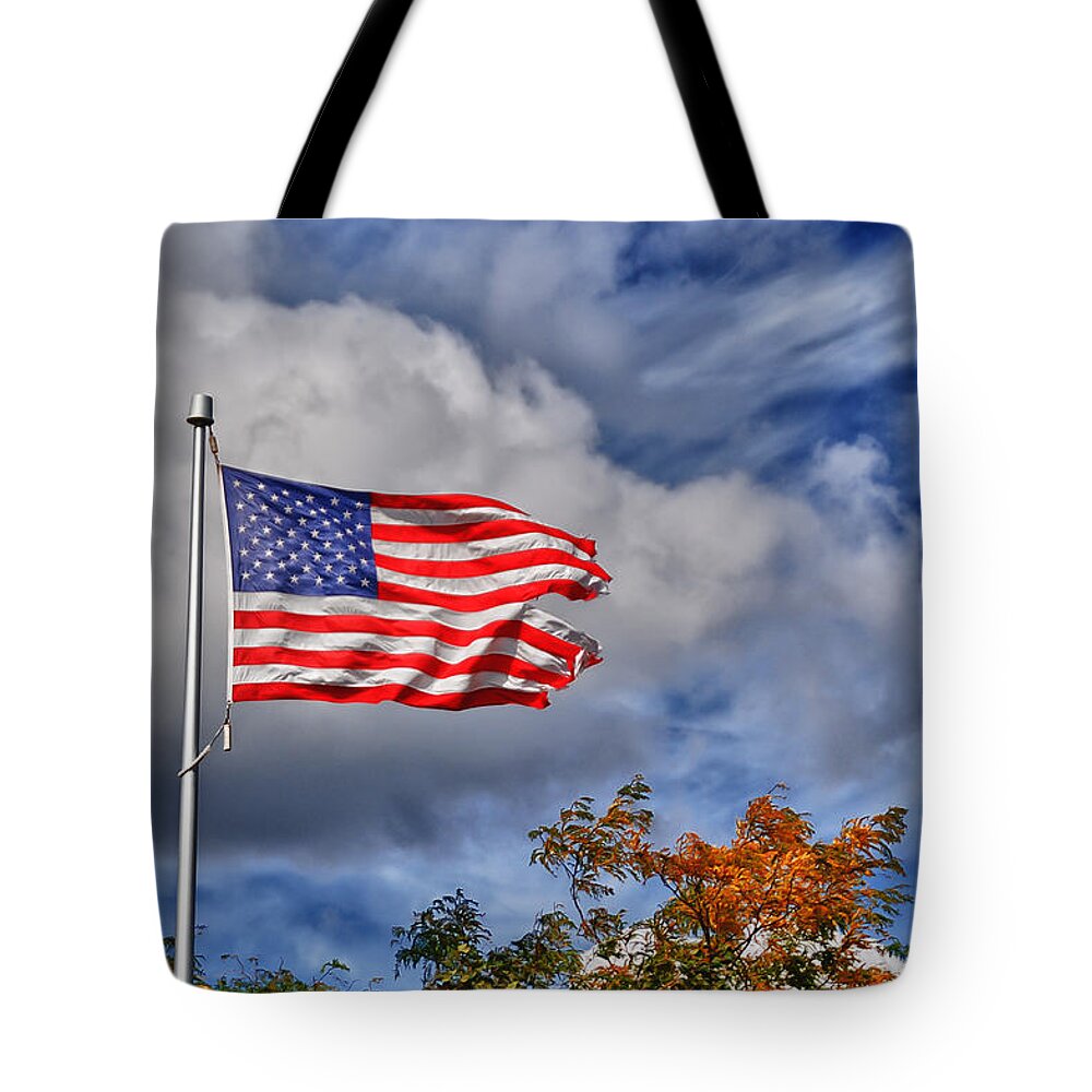 Clouds Tote Bag featuring the photograph We Remember by Guy Whiteley