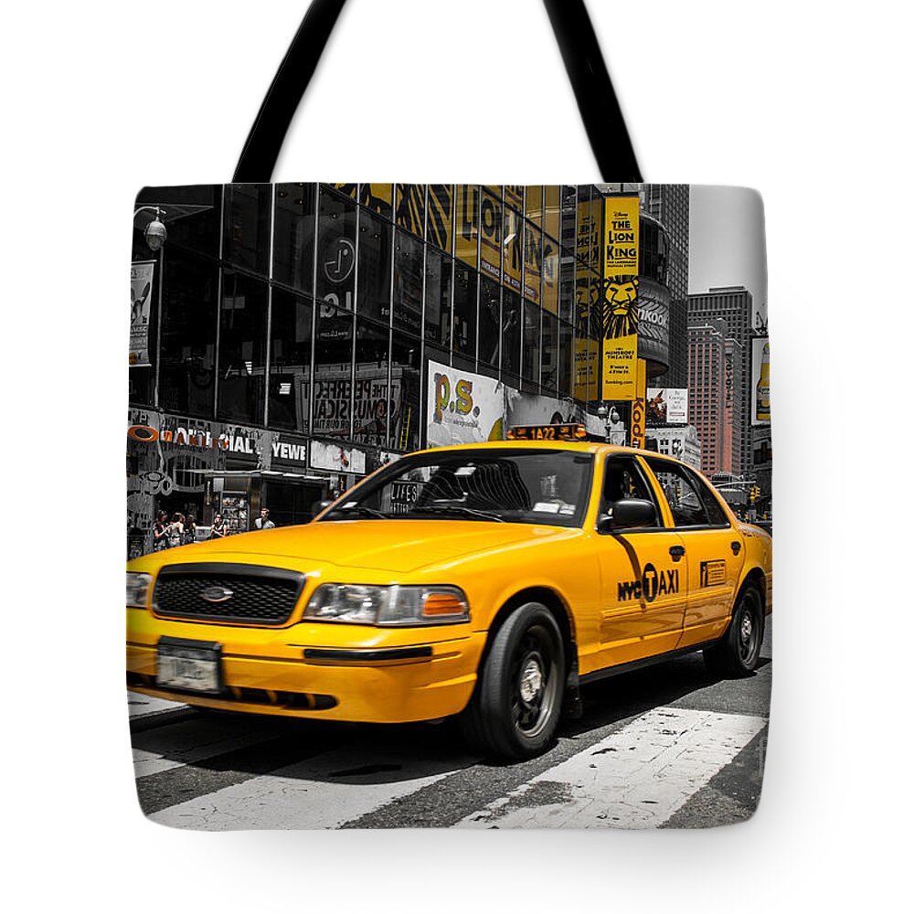 Manhattan Tote Bag featuring the photograph Yellow Cab at the Times Square by Hannes Cmarits