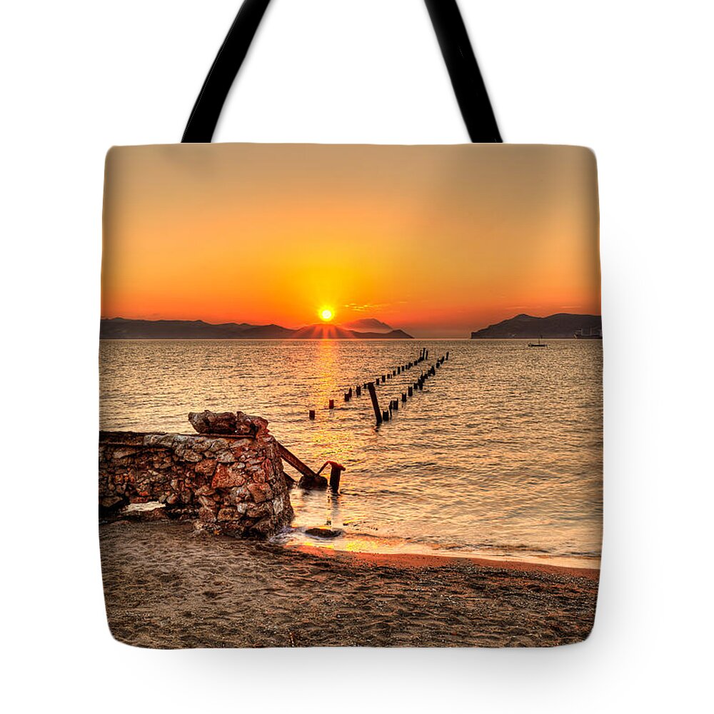 Milos Tote Bag featuring the photograph Sunset in Alikes of Milos - Greece by Constantinos Iliopoulos