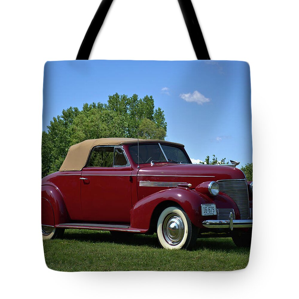 1939 Tote Bag featuring the photograph 1939 Chevrolet Convertible by Tim McCullough