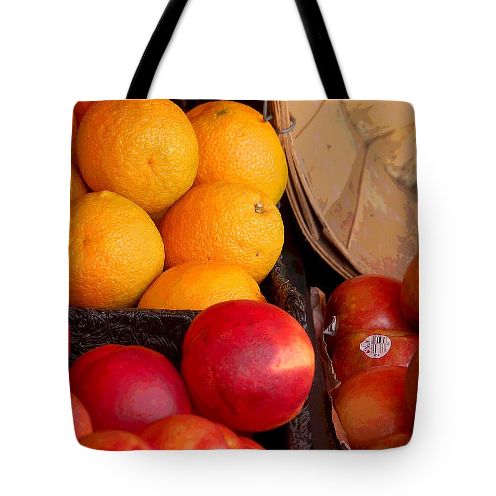 Apples Tote Bag featuring the photograph Apples to Oranges #1 by Suzanne Gaff