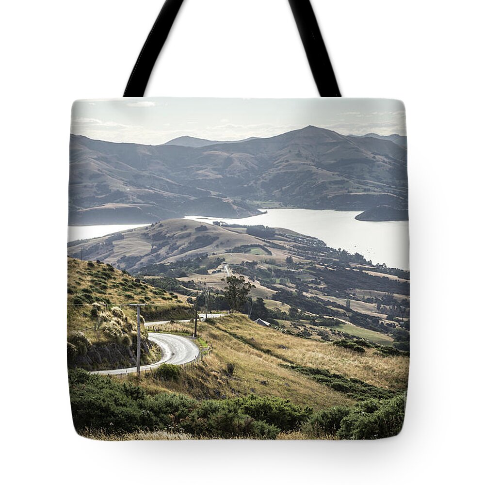 Banks Peninsula Tote Bag featuring the photograph Banks peninsula near Chirstchurch in New Zealand #1 by Didier Marti