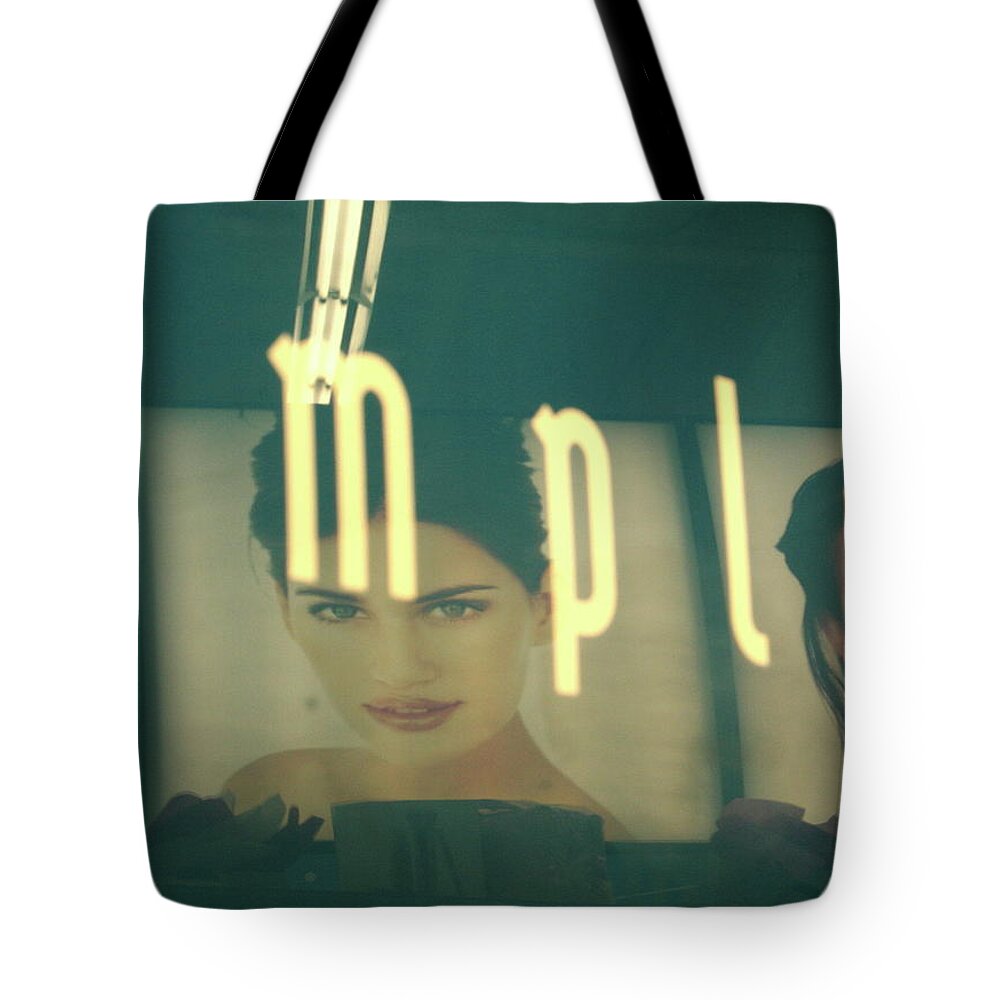 Word Tote Bag featuring the photograph Blatantly Imply by Kreddible Trout