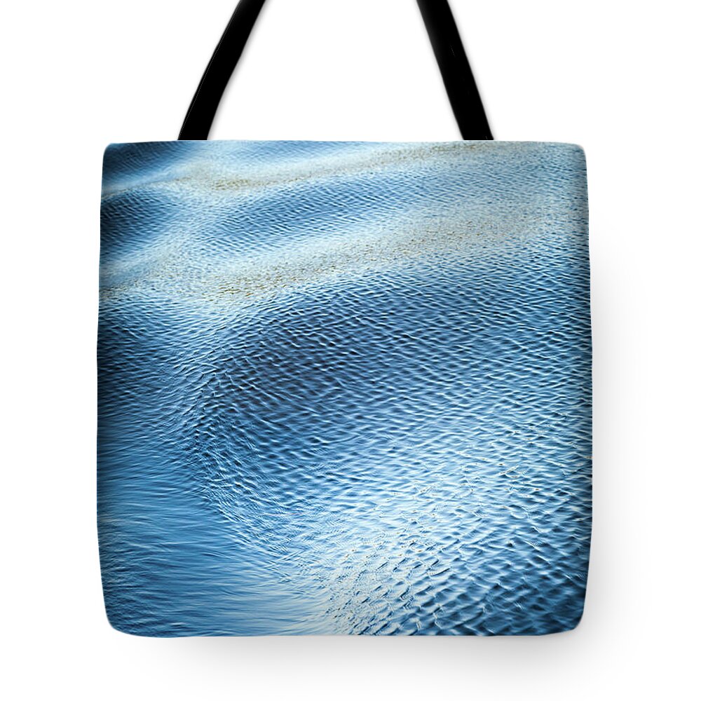 Water Abstracts Tote Bag featuring the photograph Blue On Blue #1 by Karen Wiles