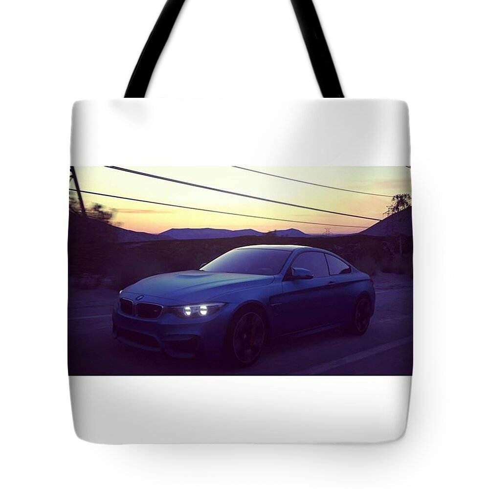 M4 Tote Bag featuring the photograph #bmw #m4 #sunset #desert #driveclub #1 by Hannes Lachner