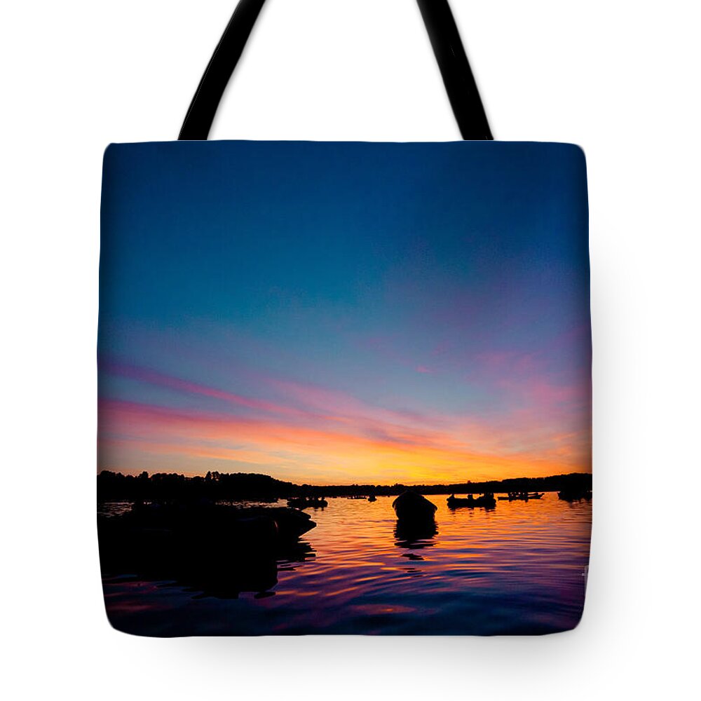 Waters Tote Bag featuring the photograph Boats and Sunrise above lake water summer time Latvia Ezera skanas #1 by Raimond Klavins