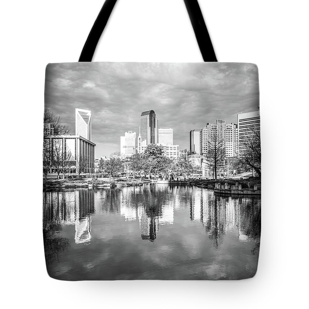 America Tote Bag featuring the photograph Charlotte Skyline Reflection on Marshall Park Pond #1 by Paul Velgos
