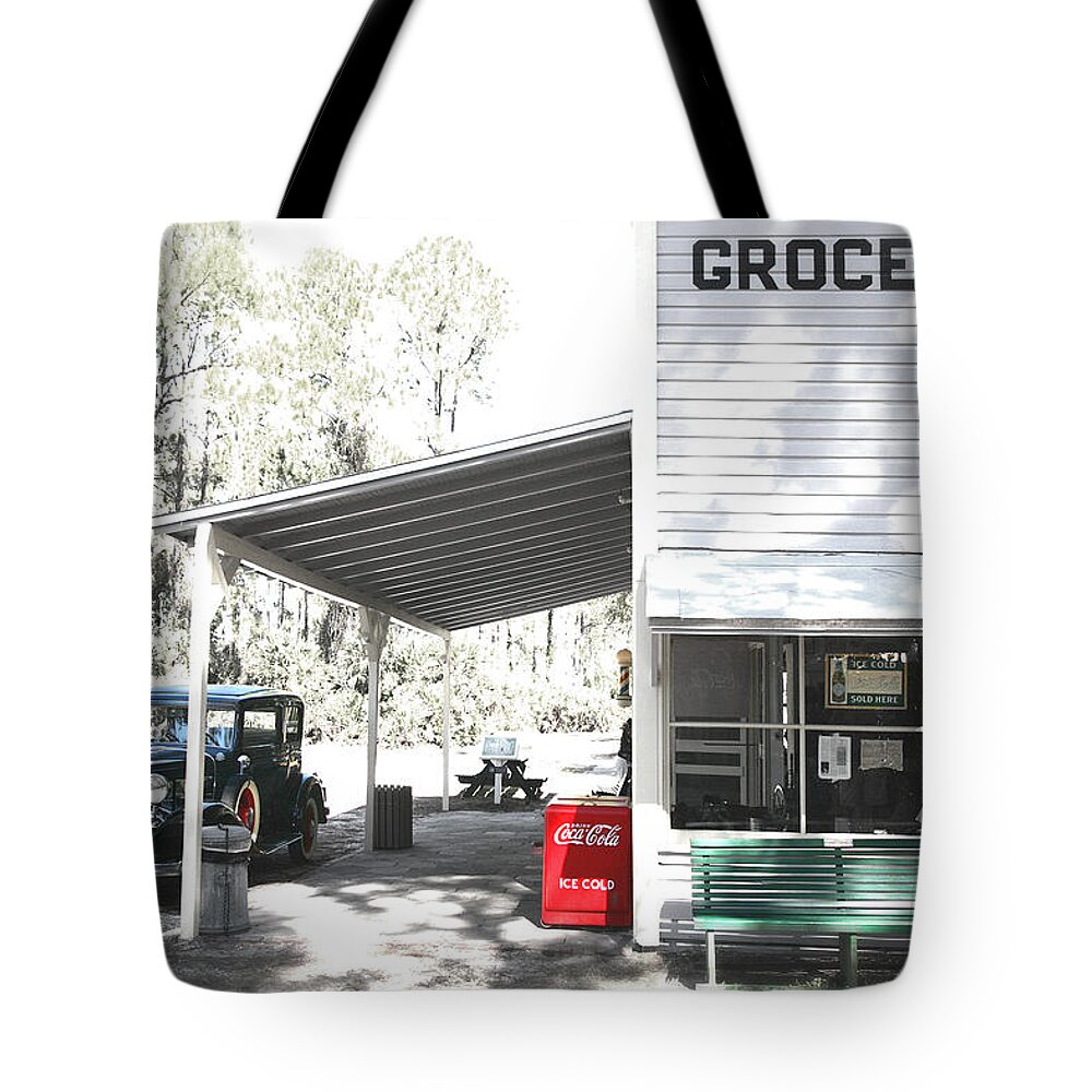Chevy Tote Bag featuring the photograph Classic chevrolet automobile parked outside the store #1 by Mal Bray