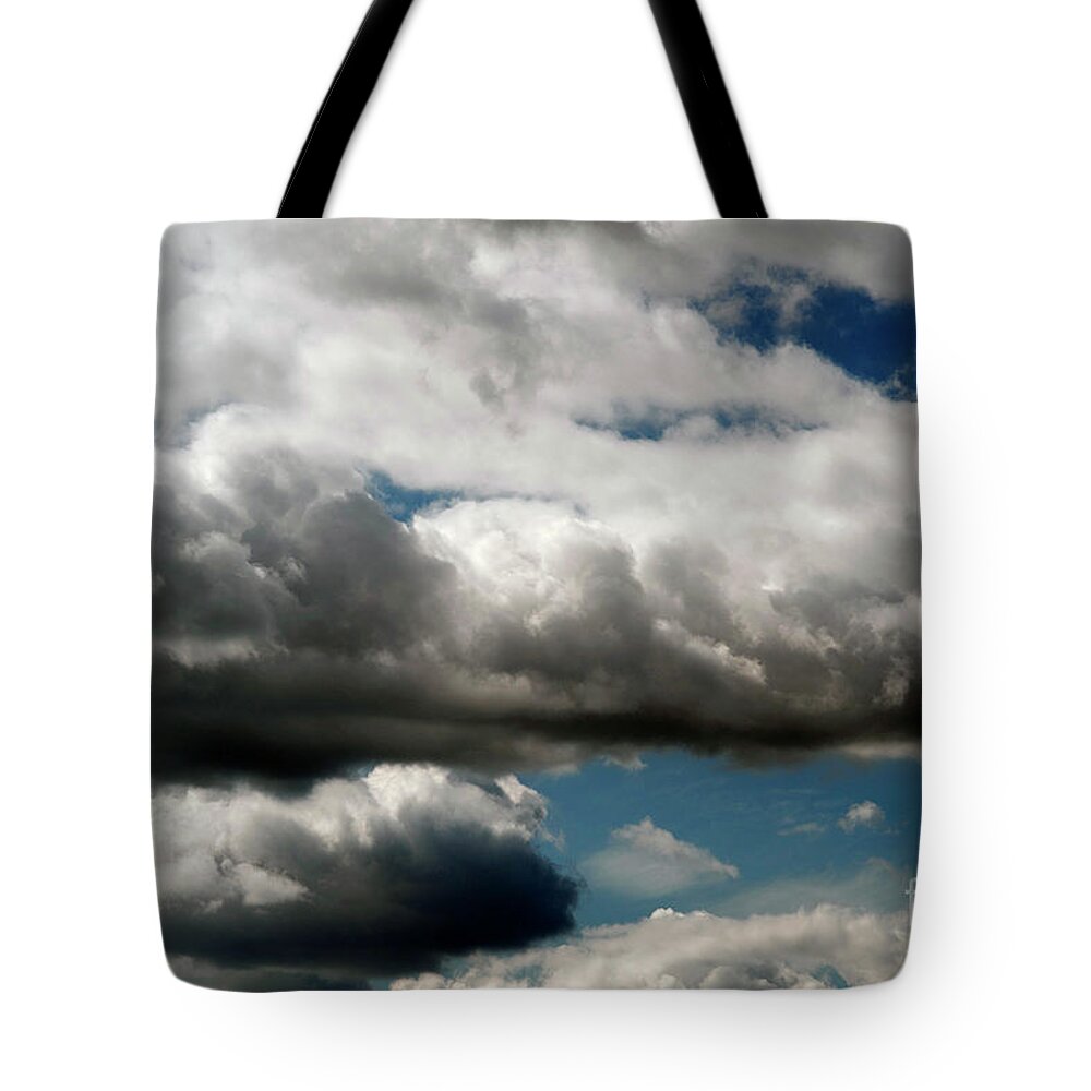 Atmosphere Tote Bag featuring the photograph Cumulus clouds with Vertical Growth #2 by Jim Corwin