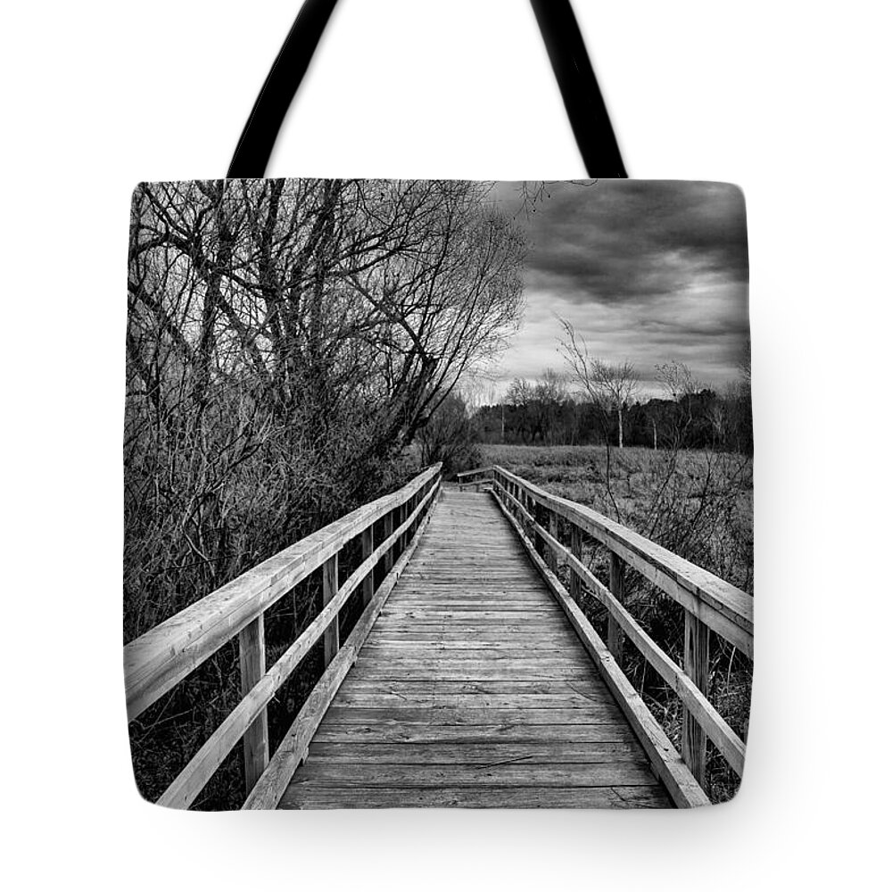 Black And White Tote Bag featuring the photograph Dark and Twisty #1 by CJ Benson