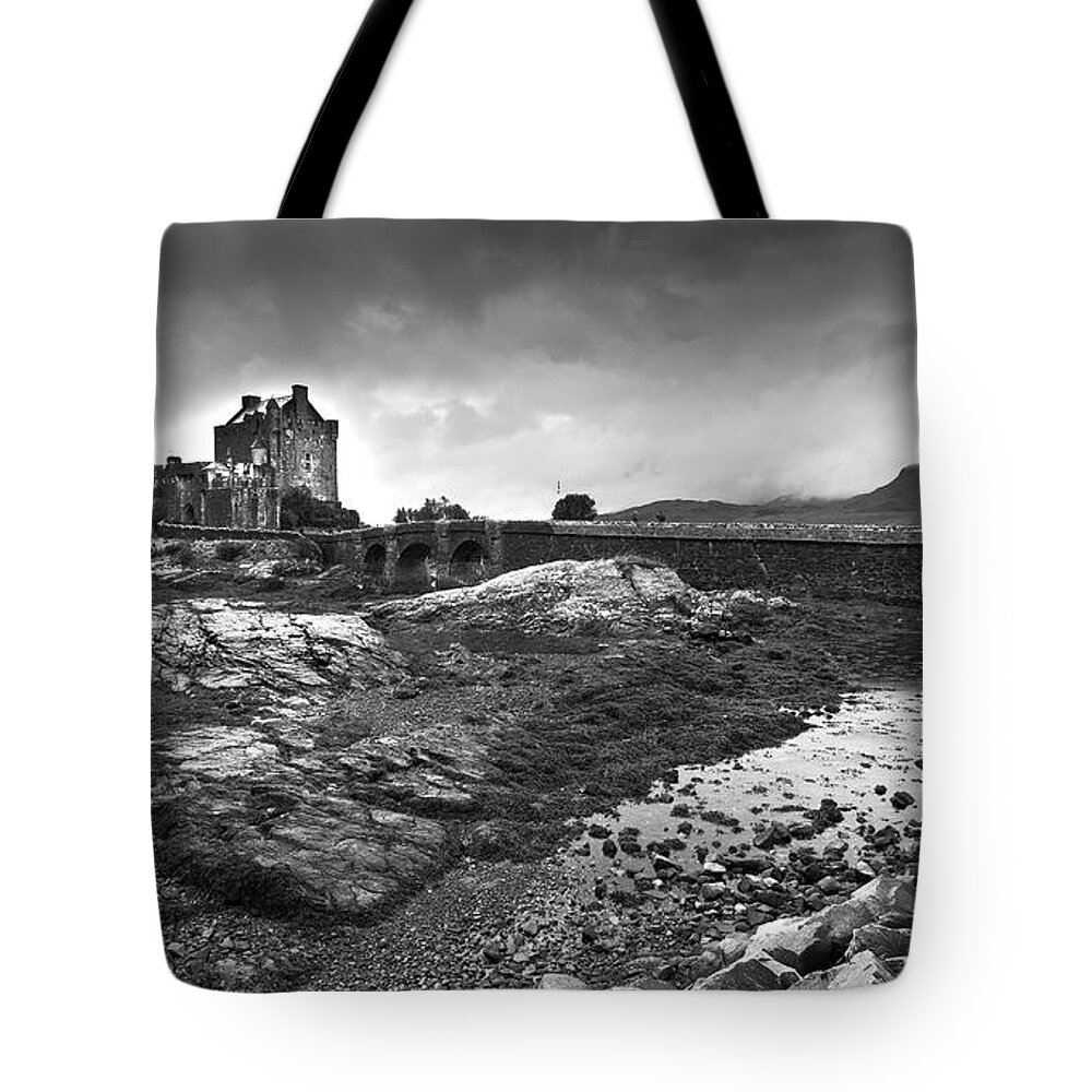 Eilean Donan Castle Tote Bag featuring the photograph Eilean Donan Castle in the Highlands of Scotland #1 by Michalakis Ppalis