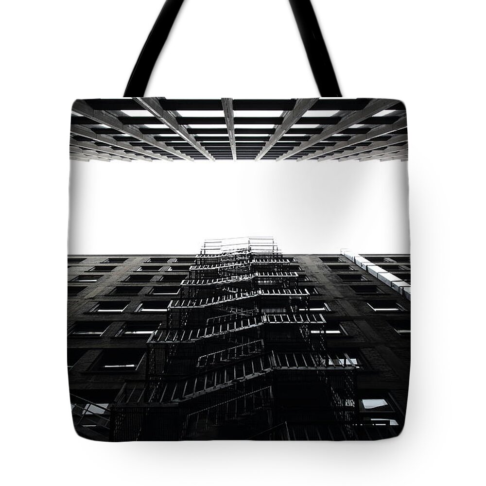 Urban Tote Bag featuring the photograph Escape by Kreddible Trout