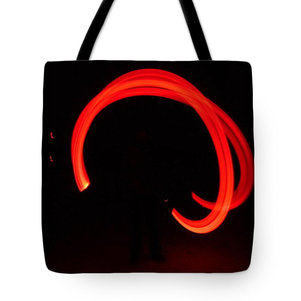Fire Juggling Tote Bag featuring the photograph Fire juggling #1 by Jackie Russo