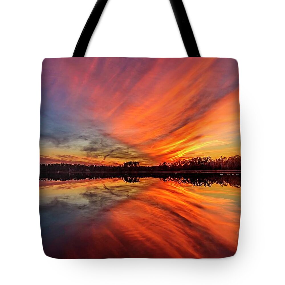 Sunset Tote Bag featuring the photograph Fire Water by DJA Images