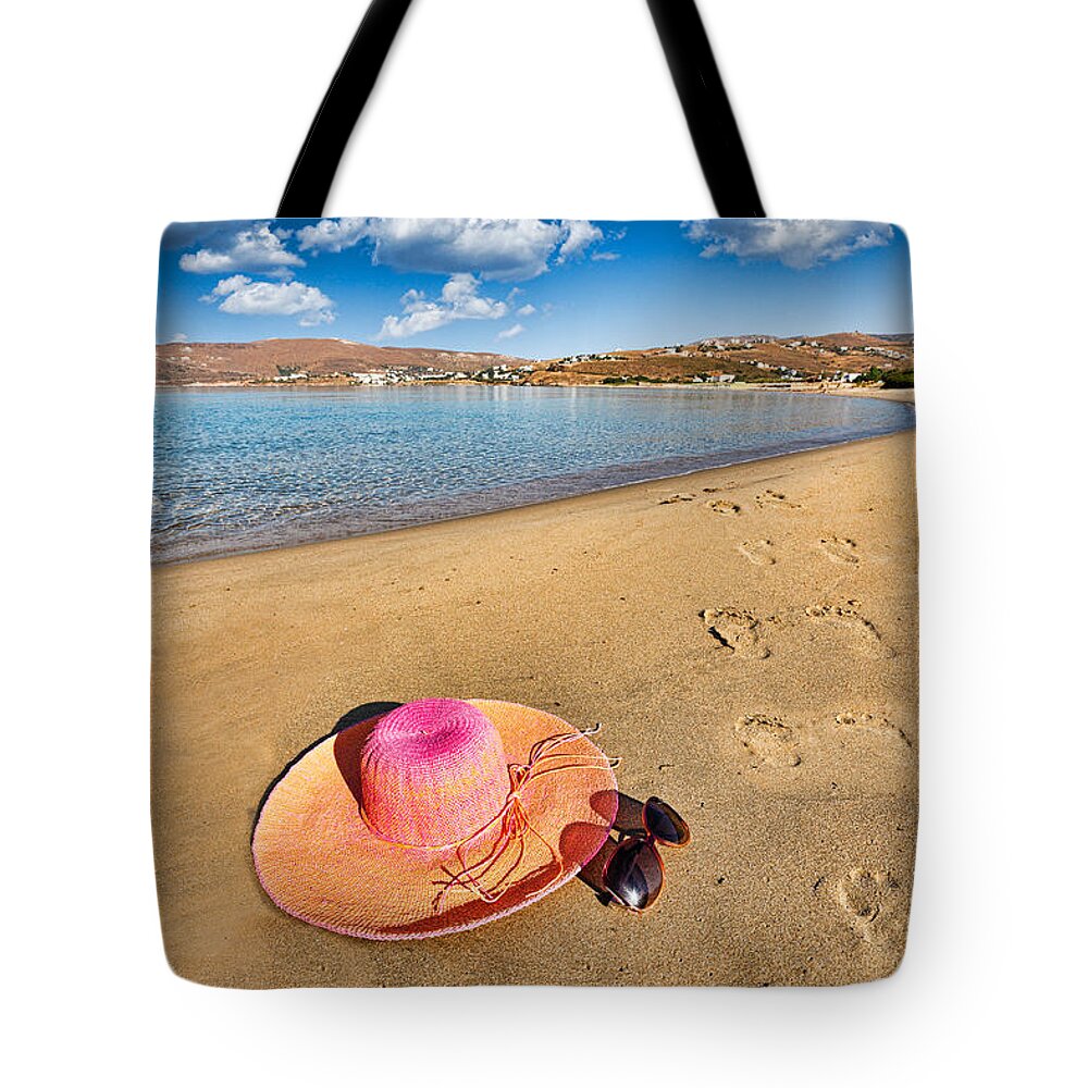 Andros Tote Bag featuring the photograph Footsteps on the beach #1 by Constantinos Iliopoulos
