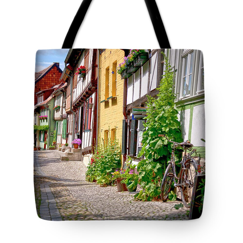 Quedlinburg Tote Bag featuring the photograph German old village Quedlinburg by Heiko Koehrer-Wagner