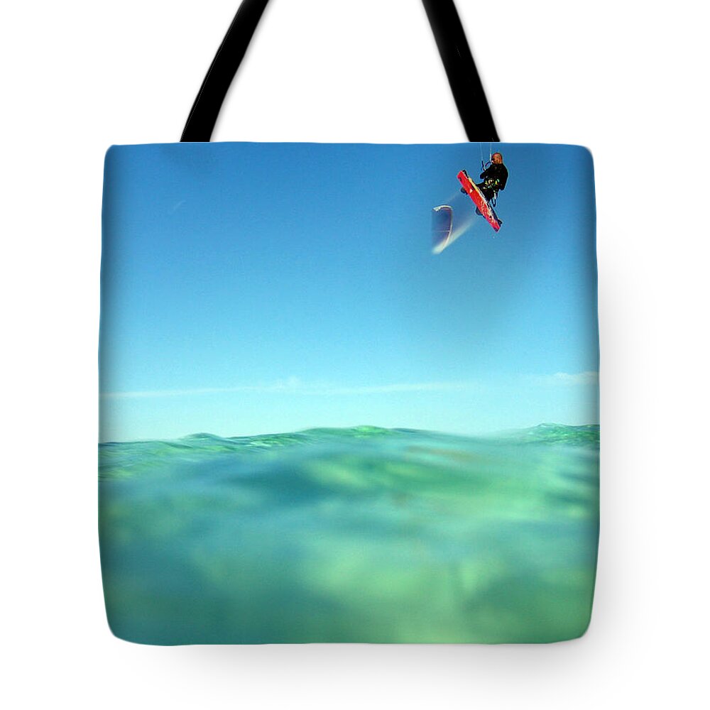 Adventure Tote Bag featuring the photograph Kitesurfing by Stelios Kleanthous
