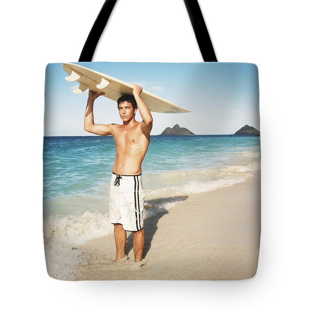 Active Tote Bag featuring the photograph Man at the beach with surfboard #1 by Brandon Tabiolo - Printscapes