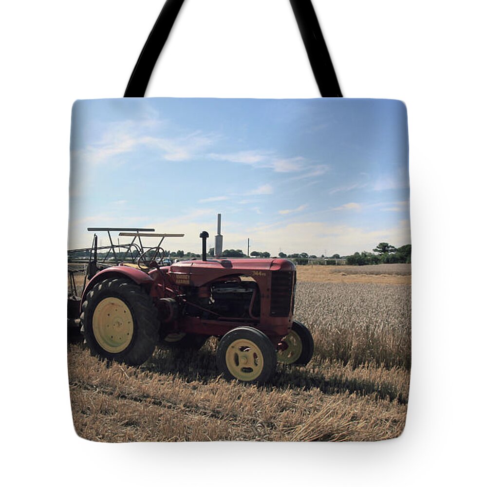 Massey Harris Tote Bag featuring the photograph Massey Harris Tractor #1 by Roger Lighterness