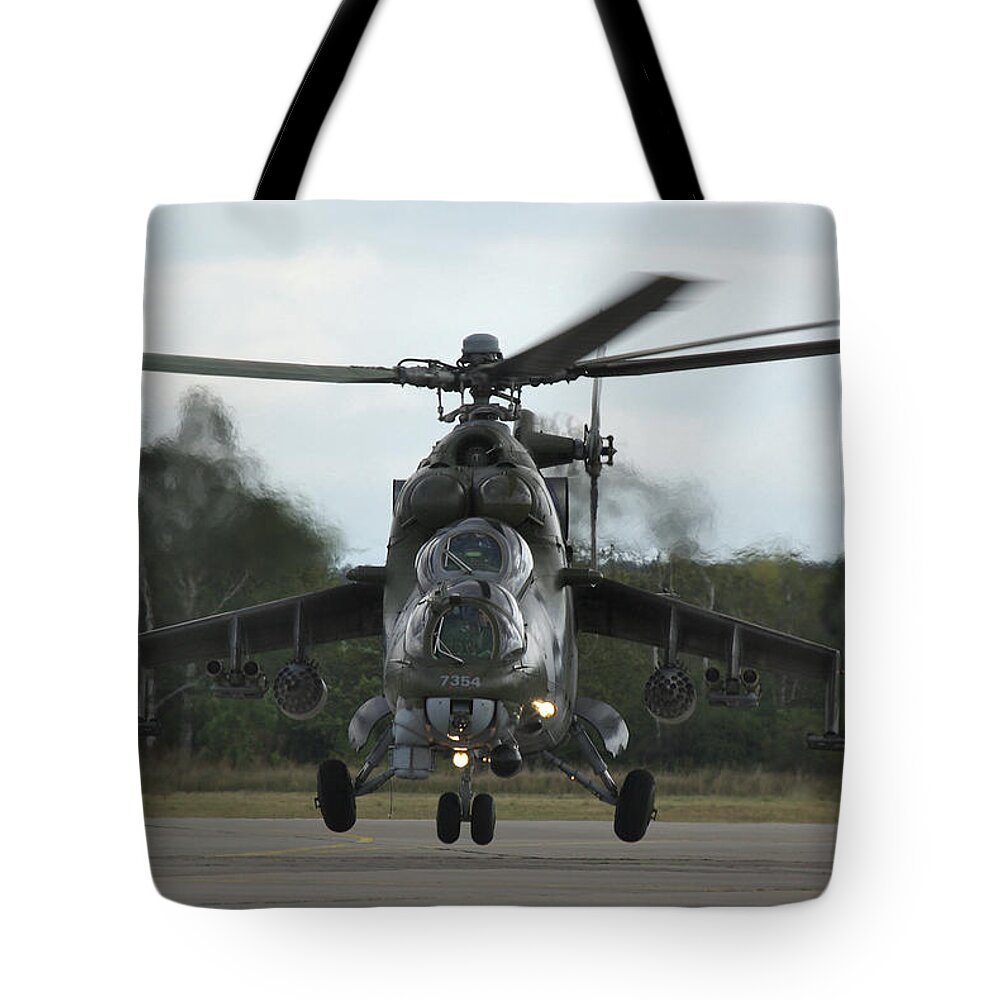 Mil Tote Bag featuring the photograph Mil Mi-24V Hind E #1 by Tim Beach