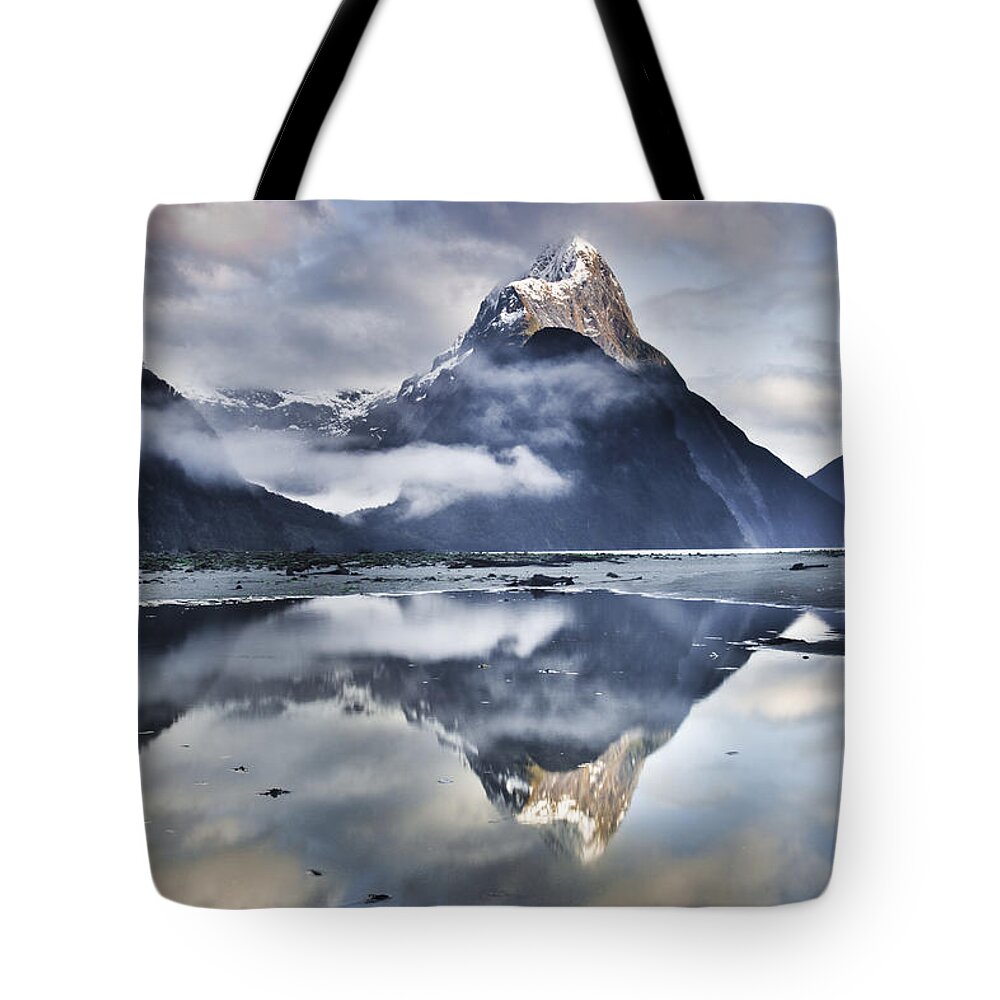 00438708 Tote Bag featuring the photograph Mitre Peak Reflecting In Milford Sound #1 by Colin Monteath