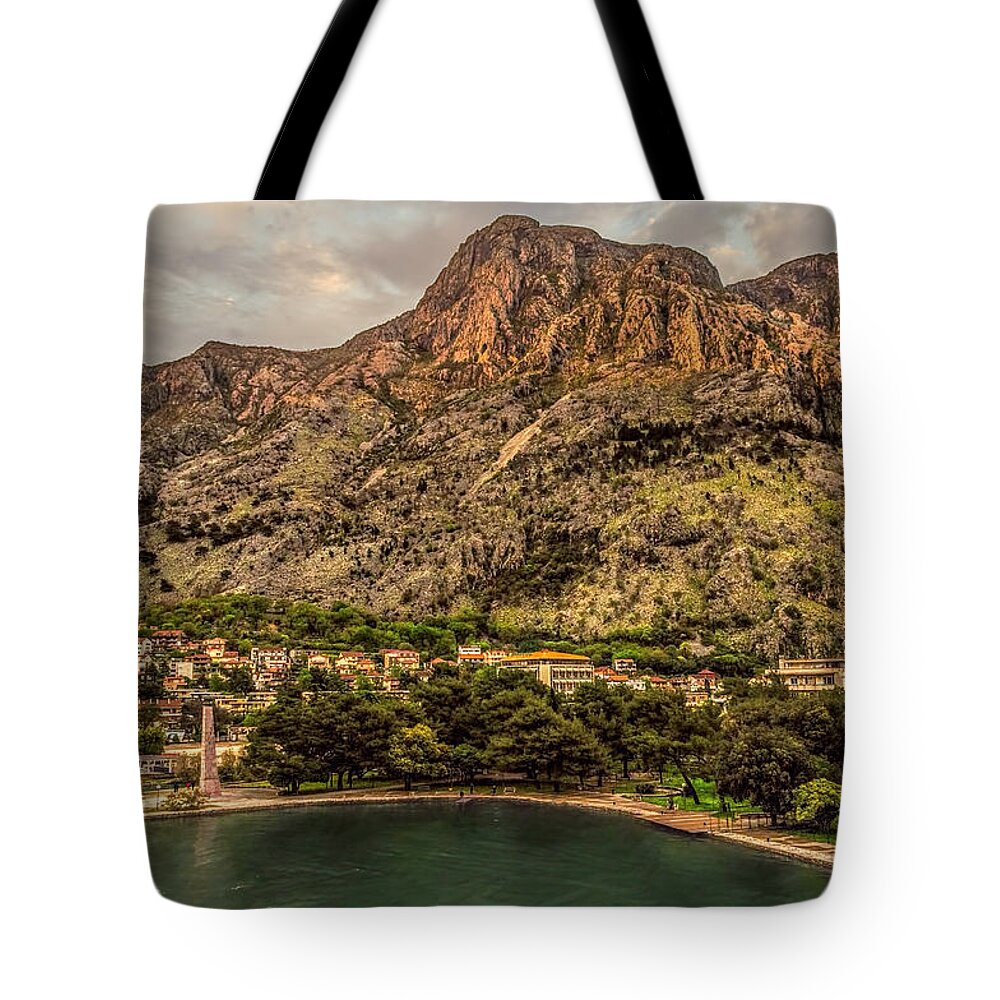 Adriatic Tote Bag featuring the photograph Nestled City by Maria Coulson