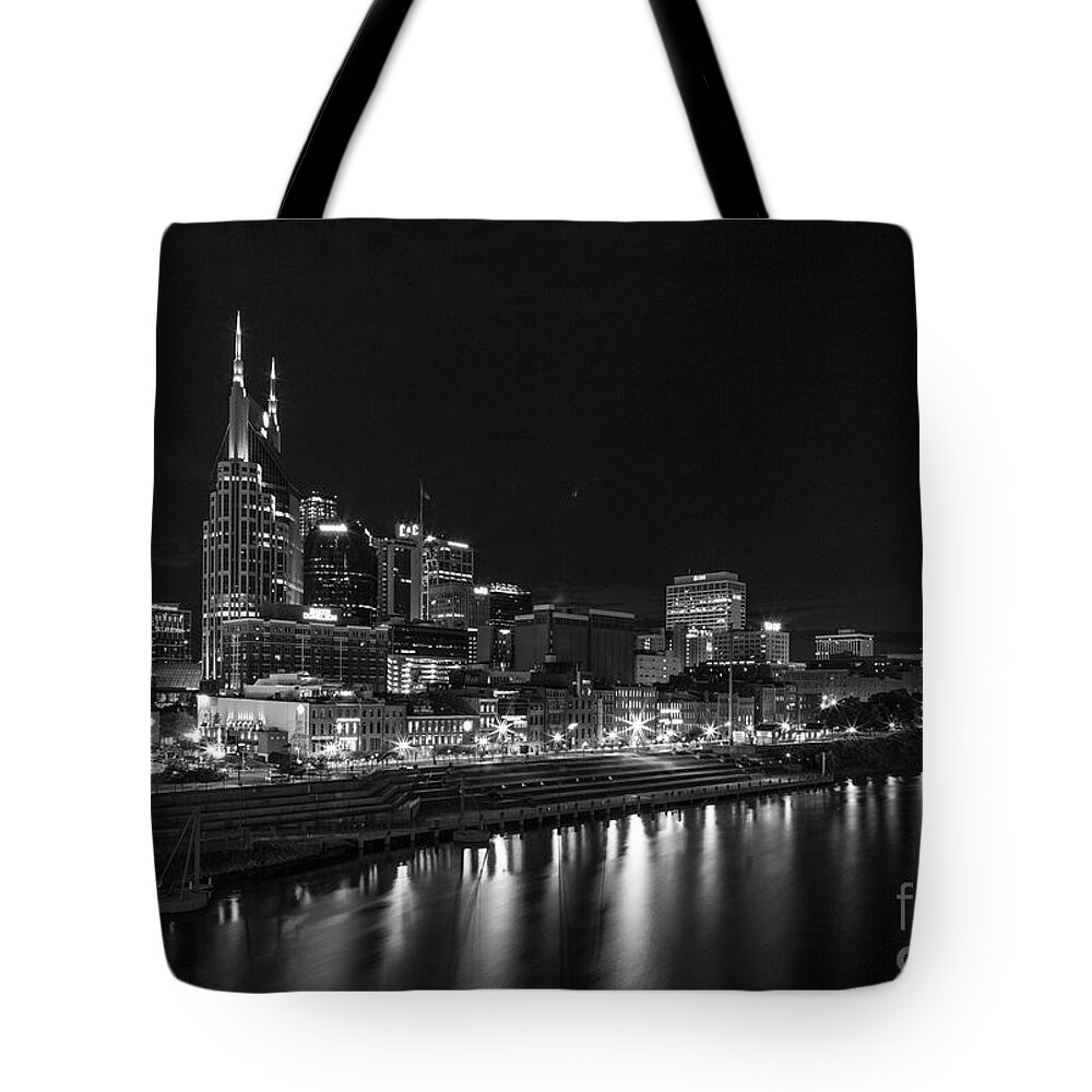 Reid Callaway Nashville Night Cityscape Art Tote Bag featuring the photograph Nashville Nite Lights B W Broadway Street Cityscape Art #1 by Reid Callaway