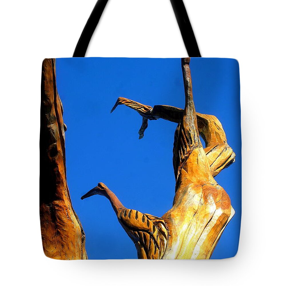 Nola Tote Bag featuring the photograph New Orleans Bird Tree Sculpture In Louisiana #2 by Michael Hoard