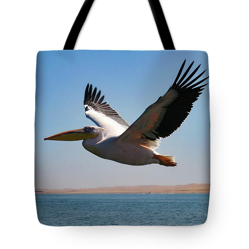 Pelican Tote Bag featuring the photograph Pelican by Smart Aviation