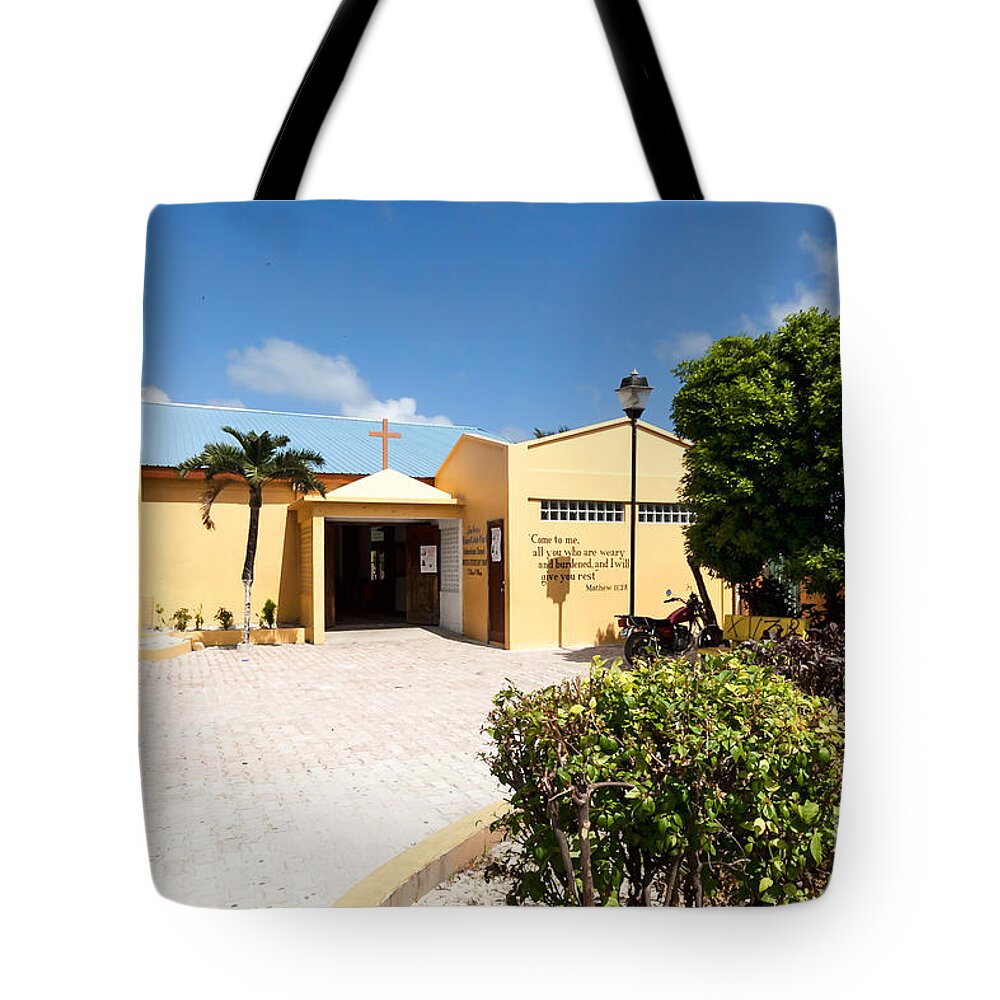 Ambergris Caye Tote Bag featuring the photograph San Pedro Roman Catholic Church #2 by Lawrence Burry