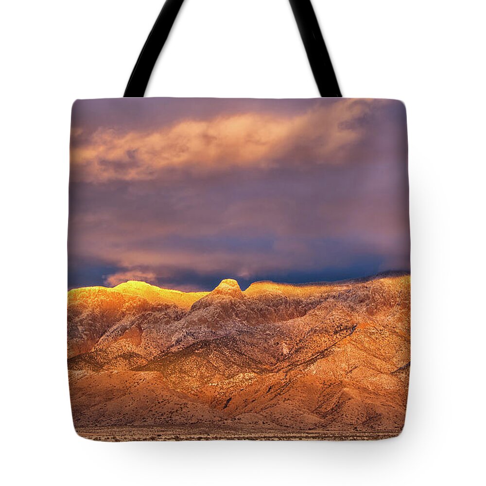 Sandia Crest Tote Bag featuring the photograph Sandia Crest Stormy Sunset #1 by Alan Vance Ley